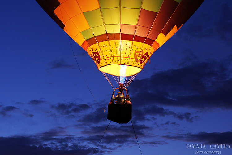 Hot air balloon against a dark sky | Learning about hue and color will help you to capture better photographs | Photography Tip