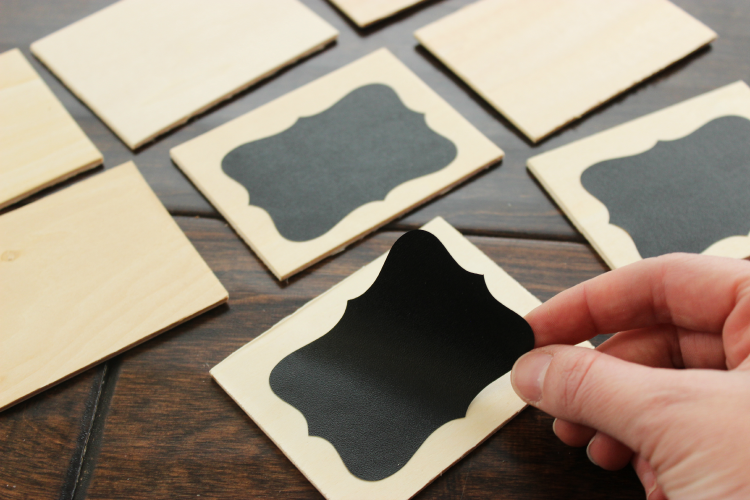 Vinyl chalkboard stickers on wood squares.