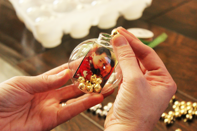 Add sparkles, bells, or other filler to the inside of your ornament to give it weight and make it shine. 