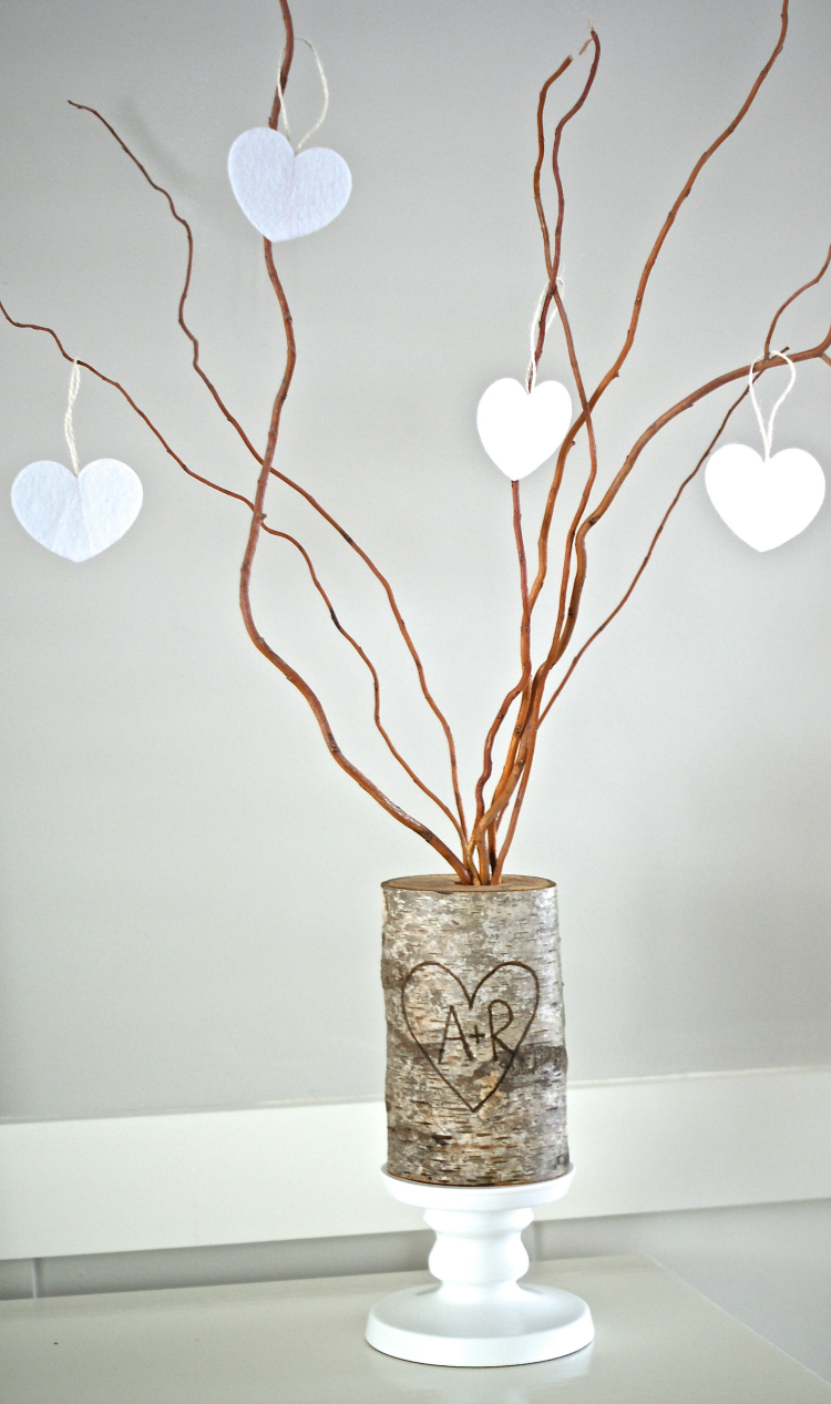 Make a rustic family tree with a birch log, branches, and some hearts. Perfect way to celebrate your love for Valentine's day or the whole year.  Home decor DIY.