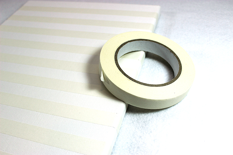 Create stripes on your canvas with masking or painters tape.