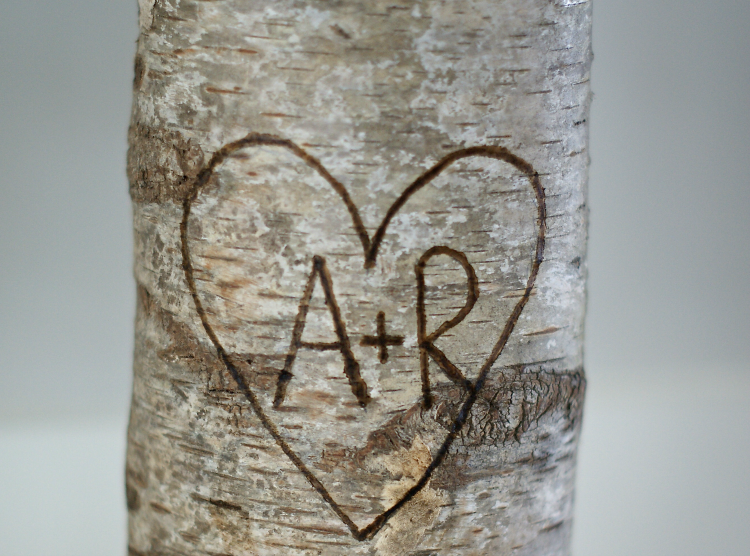 A wood burner is perfect for adding your initials or any other message to your birch log. 