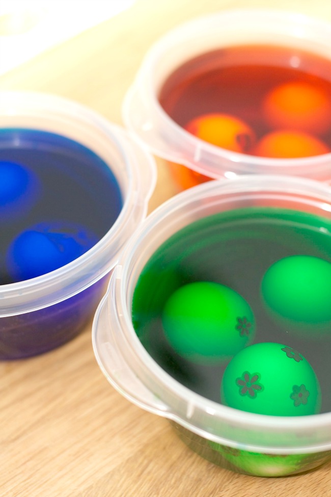 Soak your Easter eggs in the dye solution. The longer they sit, the more vibrant the color will be. 