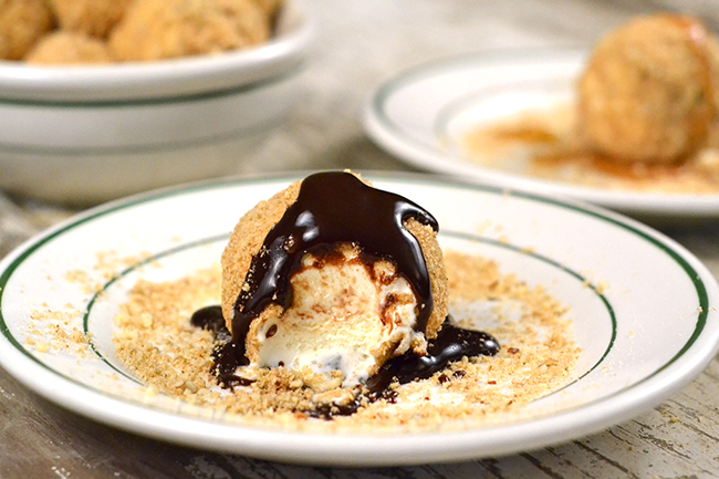 Add chocolate sauce or caramel topping to your fried ice cream. 