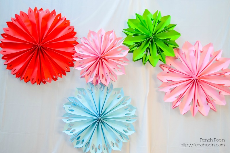 Large paper pinwheels are a great prop for photo backdrops. 