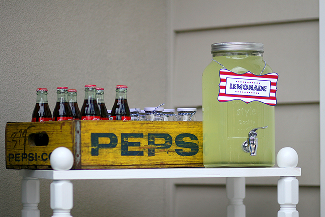 Love the idea to display soda in old soda crates for a backyard party. 