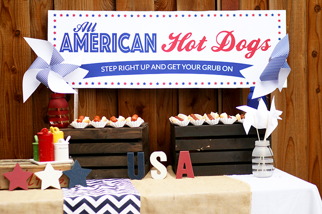 Don't forget the condiments and a cute sign when you create a hot dog stand! Love the idea to set them up high on old pallets. Great for an outdoor party.
