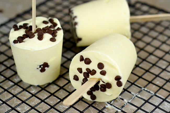 Pudding popsicles are more fun when you add chocolate chips into the mix! Vanilla pudding pops recipe. 