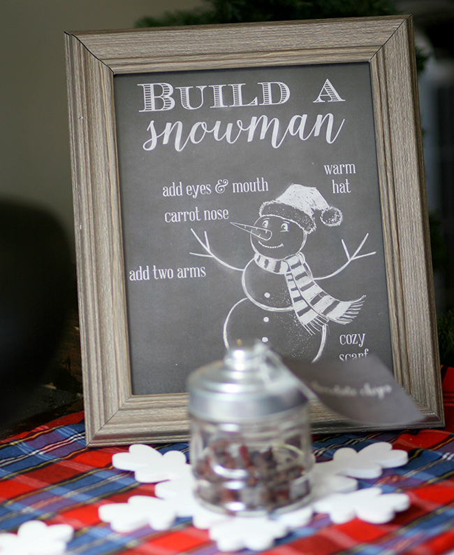 Fun activity for a Christmas party is a build your own snowman station. Get the free printable here. 