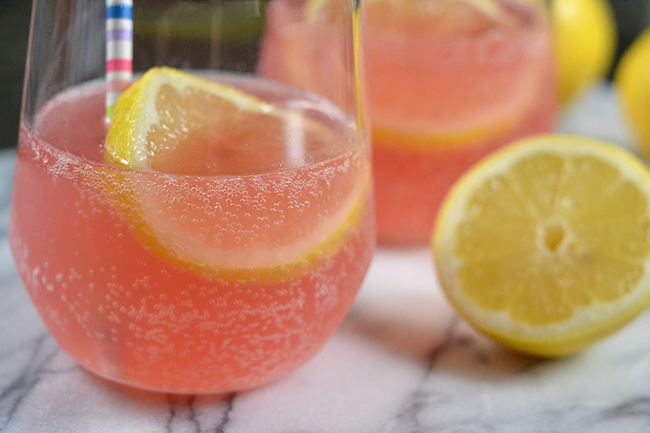 Love this simple wine punch. All you need is Moscato, pink lemonade, 7Up, and a lemon. Mix and enjoy! Great recipe for summer entertaining. 