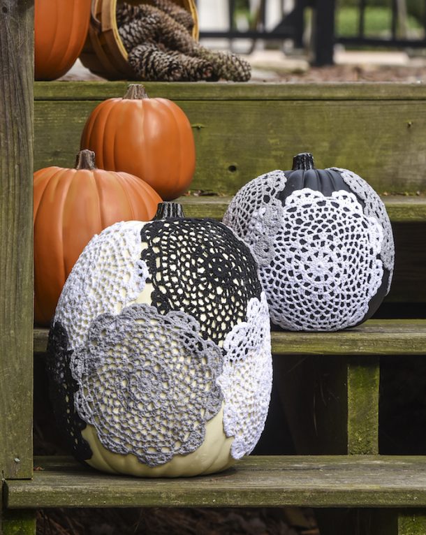 Doily pumpkins are a cute way to do a halloween craft with pumpkins!
