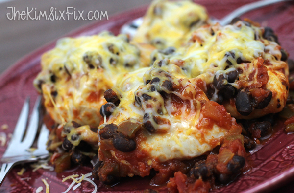 Smothered chicken with salsa and black beans is beyond delicious!
