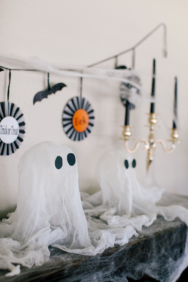 Cheesecloth ghosts are the perfect DIY for moms and kids!