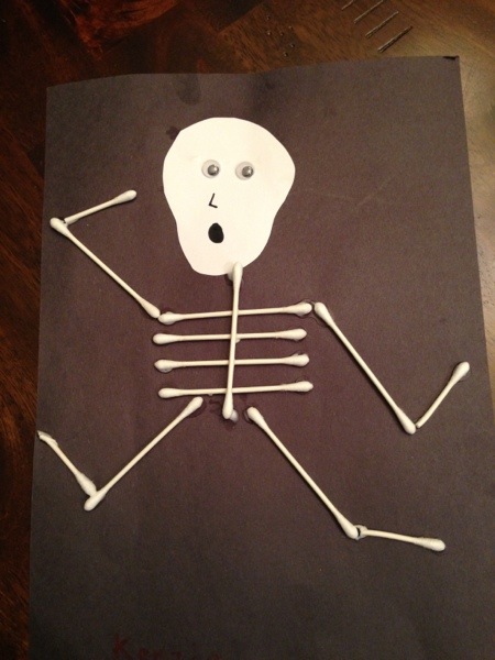 Use bathroom Qtips to make this cute skeleton!