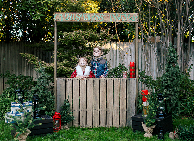 Make your Christmas photo extra cute with this DIY Christmas Tree stand as a prop. The kids will have a blast playing with it while you capture the perfect picture. 