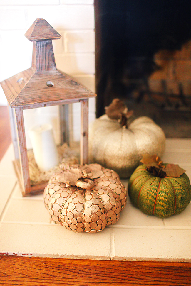 Use lanterns and faux pumpkins to create simple and clean decor!