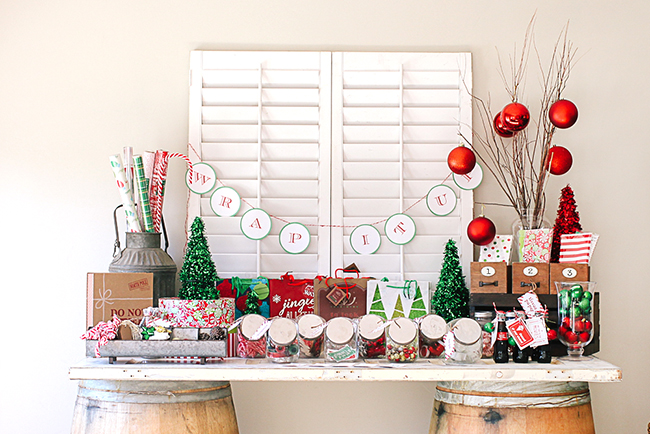 Use classic Christmas colors to make a bright display for your Wrapping paper party!