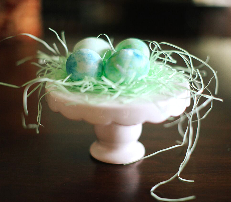 Create easy, marbled Easter Eggs with this simple dying technique. Secret ingredient: Cool Whip! 