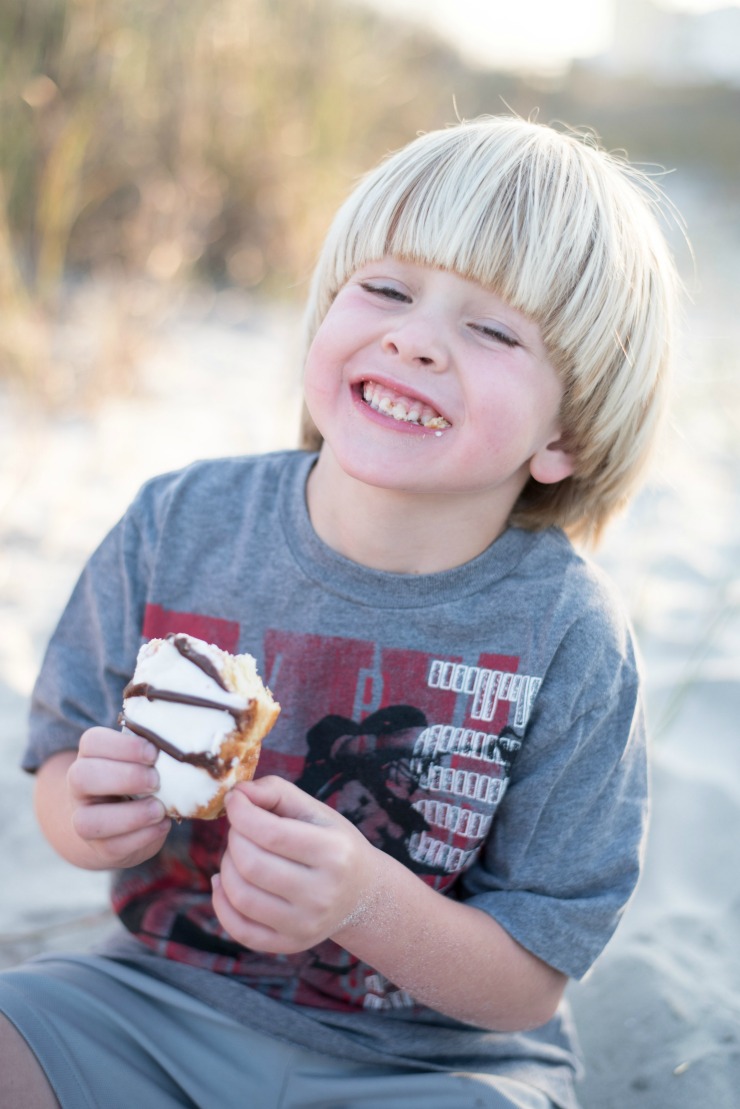 Boy with doughnut. Capture the small moments of your family adventures. 