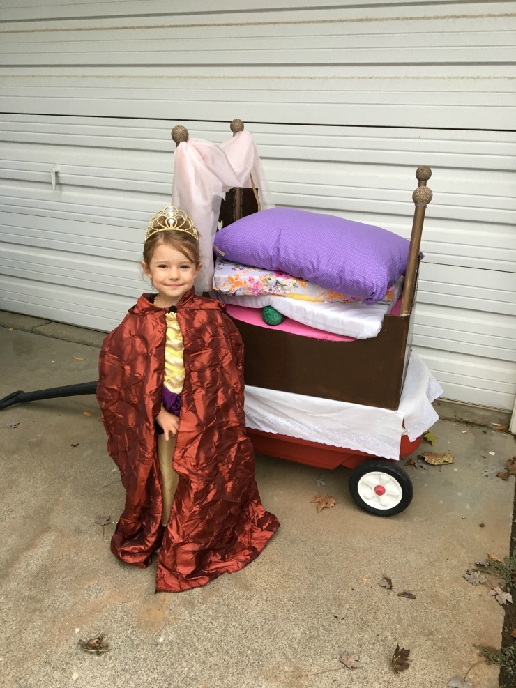 Use stacks of pillows for mattresses to create this cute Princess and the Pea costume.