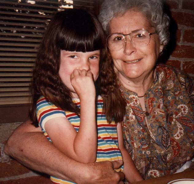 mary hugs emily on grandmas birthday