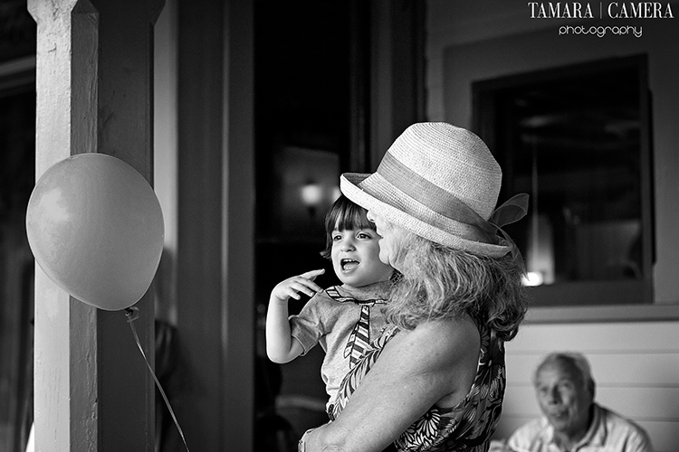 Baby and Grandma with balloon in black and white