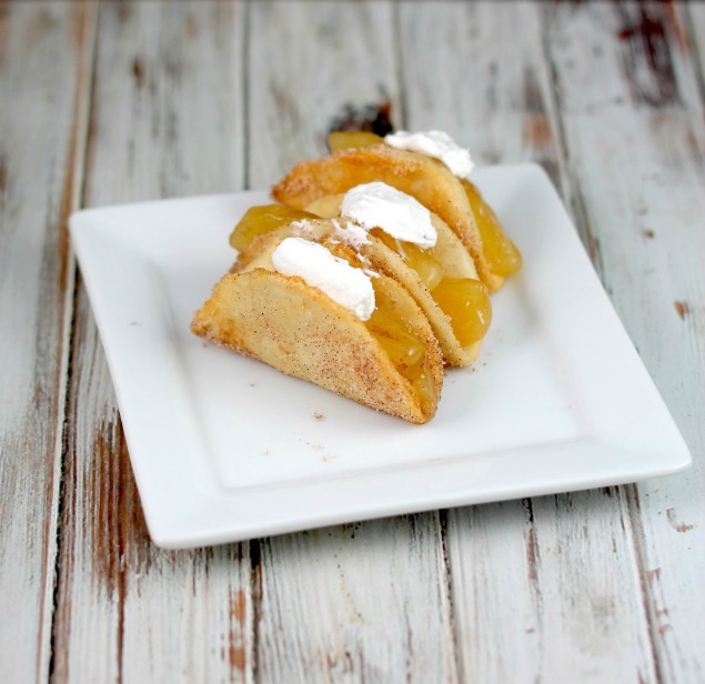 Apple pie never tasted this good - warm, cinnamon apples in a crispy fried taco shell. 