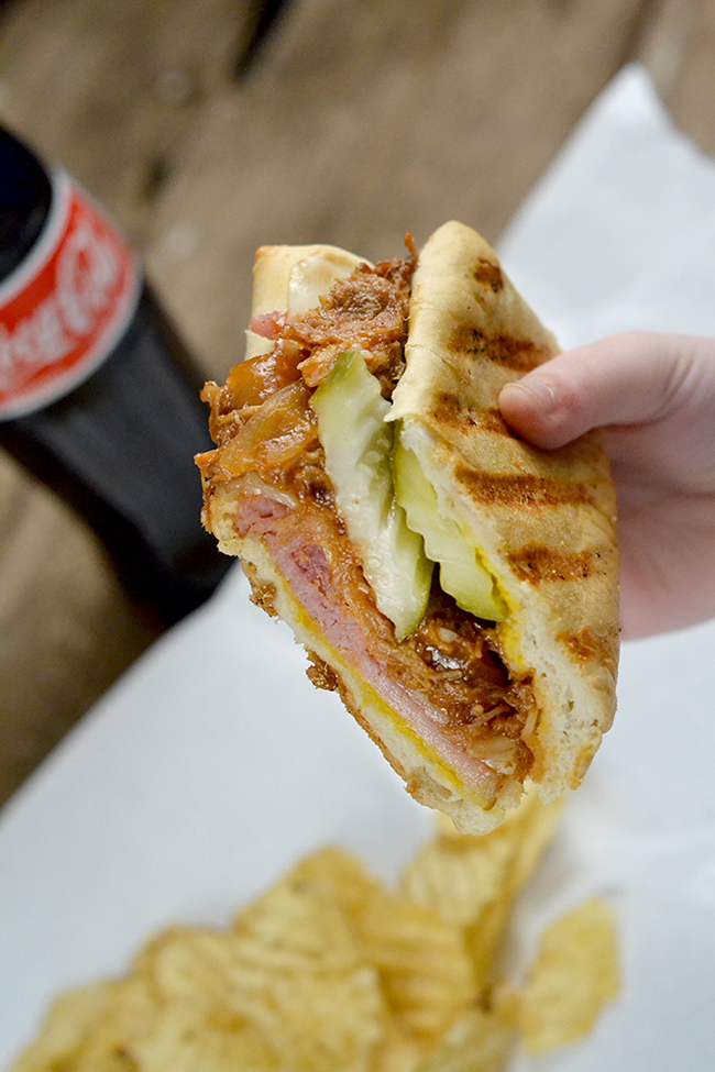 Cubano Sandwich - This sumptuous grilled sandwich—a crusty roll filled with roast pork, ham, Swiss cheese, and pickles— made famous in the movie Chef.