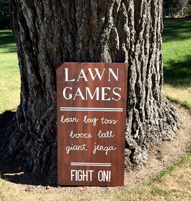 Lawn games are a cute idea for an outdoor wedding. Love the sign - it is a lot of fun. Great DIY wedding decorations ideas.