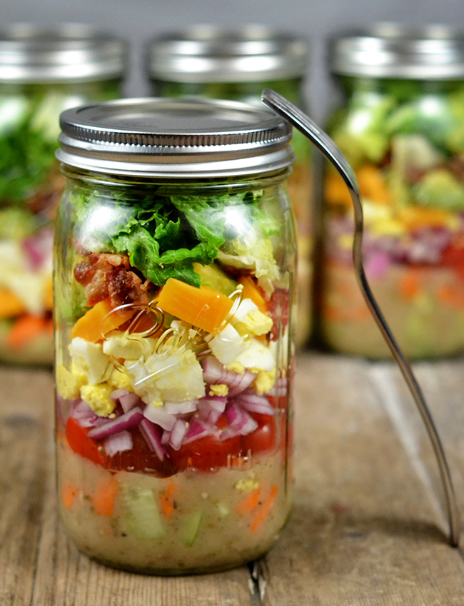 This is how you make a mason jar salad. If you pack it in this order, it will be perfect when you open the jar and dump it in a bowl. 