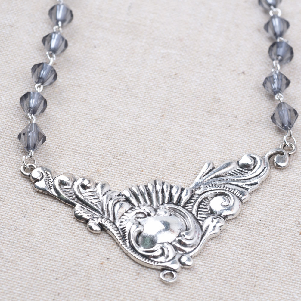 Connect your triangle to the bead chain. 
