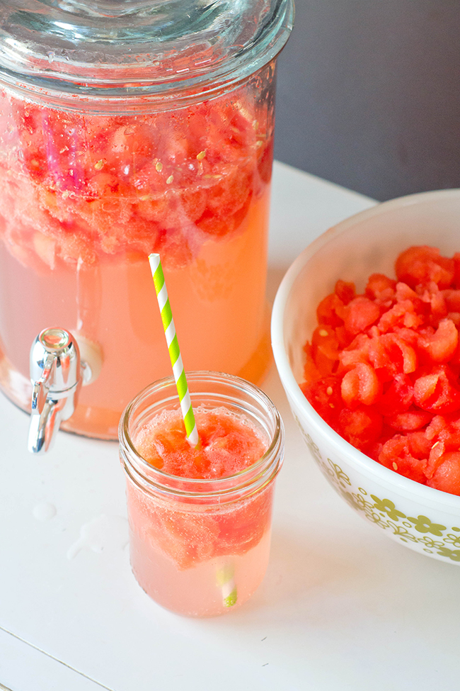 Add sparkling grape juice, sparkling pink lemonade, and lemon lime pop to your watermelon balls to make this easy Watermelon Punch Recipe. Super easy refreshing summer drink.  Swap the grape juice out with champagne if you want. 