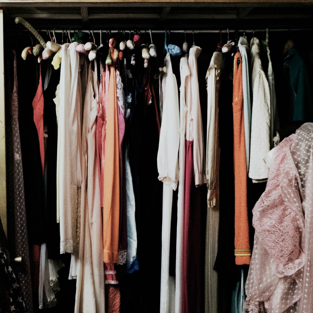 clothes hanging in closet