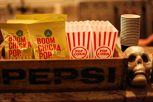 Fear the Walking Dead| A cute way to serve popcorn for a movie premier or TV viewing party is to arrange it in an old soda crate. Guests of all ages will dig in!