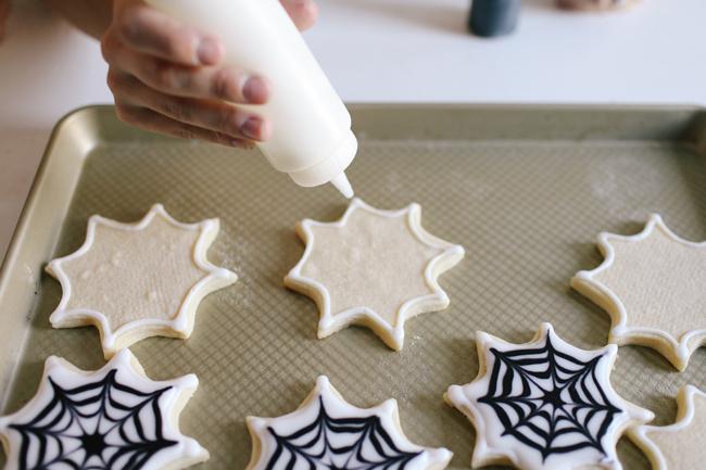 Use a food grade squirt bottle to help you achieve the cookie decorating skills of a pro when you make these cute Halloween treats!