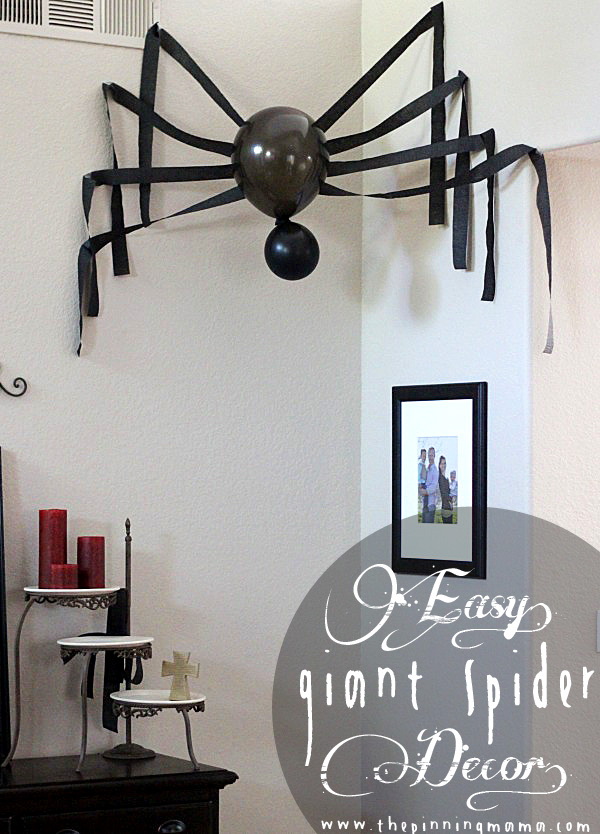 Use balloons and crepe garlands to create a spooky spider!