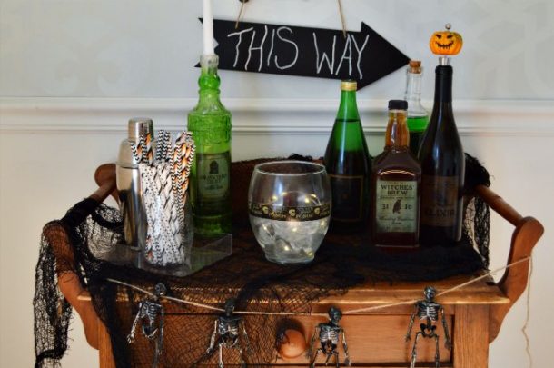 Use this spooky bar display to serve spooky concoctions!