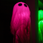 DIY Glow In The Dark Floating Ghosts are the perfect Halloween decor — a great mix of fun and spooky. Light 'em up, and you'll have the best decorated house on the street.