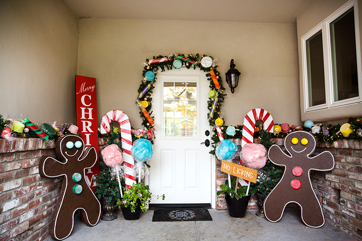 Transform your front porch into a candy land gingerbread house with giant candy decorations! Love the giant candy garland. (Easy step-by-step tutorials with video.)