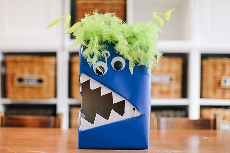 Create a fun mouth and attach a feather boa to make this spooky monster box!