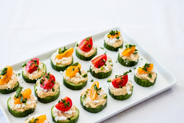 Cucumber and Hummus Bites with cherry tomatoes 