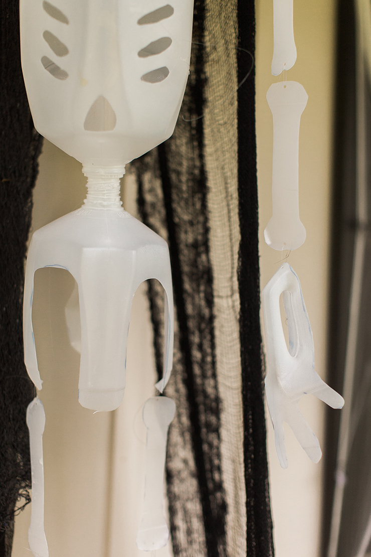 Use several milk jugs to make a skeleton that is perfect for hanging outside.