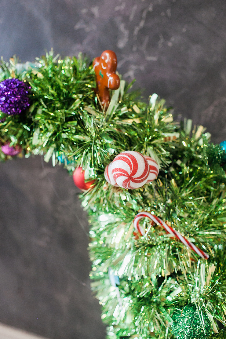 Create a slight curve using your chicken wire, and then wrap it in tinsel!