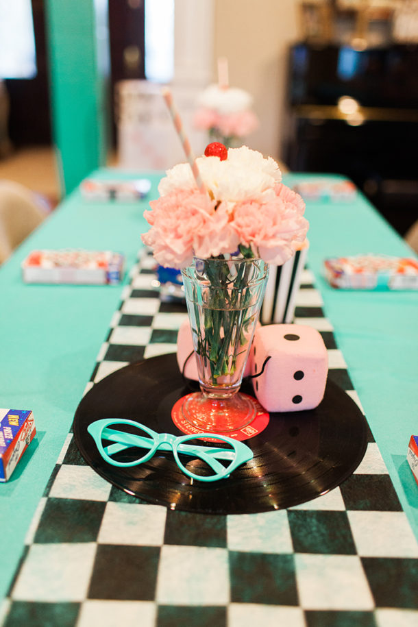 How to throw the perfect 1950s Retro Sock Hop with delicious food, cocktails, menus, tablescapes, favors, and more. It makes for a super fun, special party!