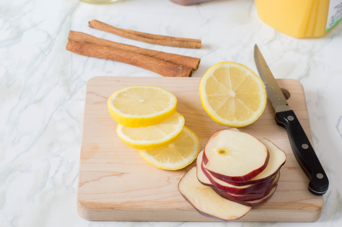 cutting lemon slices for sangria