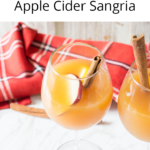 Apple Cider Sangria uses just a handful of ingredients, and is perfectly crisp and refreshing for fall. Make this recipe for all of your fall get togethers!