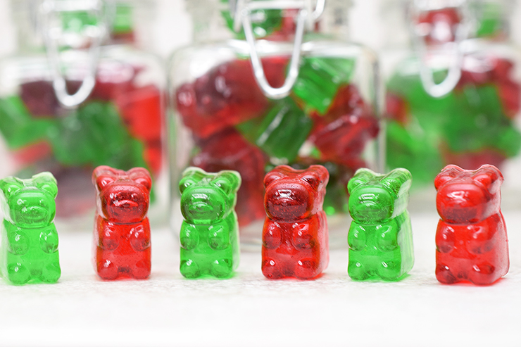 line of red and green gummy bears