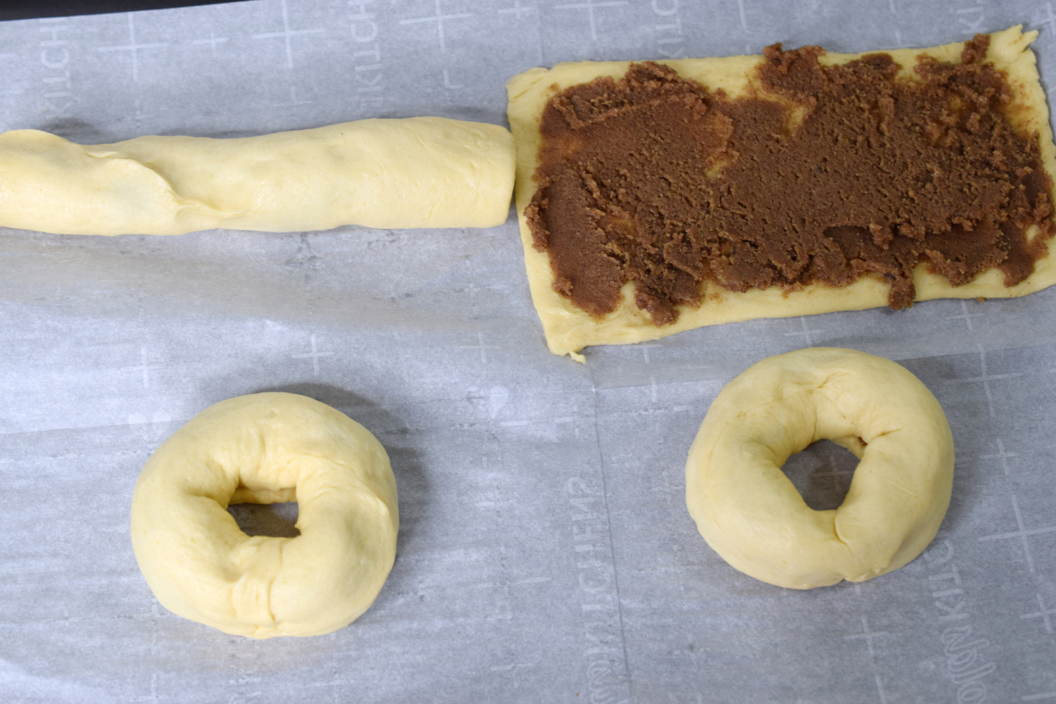 Add filling to crescent rolls and roll them up like doughnuts.
