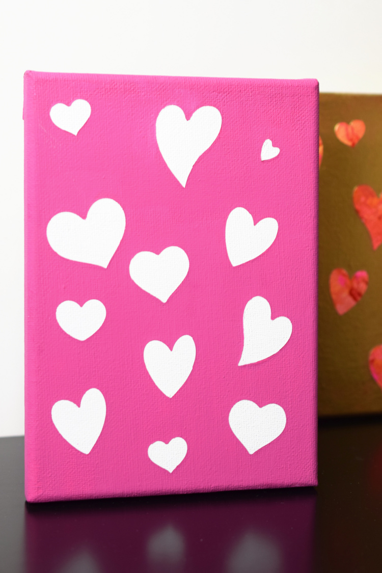 Pink canvas with white hearts.