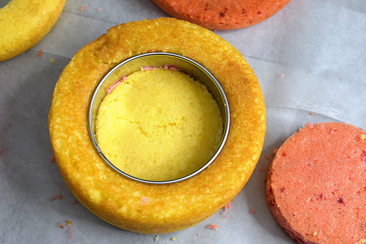 Yellow cake with a ring cutting a circle in the middle.